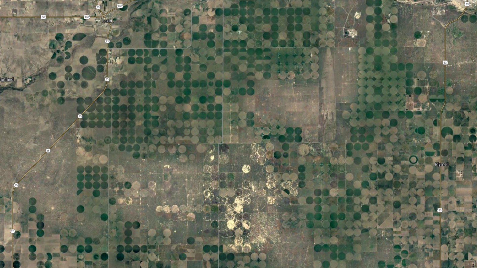 Modern imagery shows the impacts of crop expansion and groundwater withdrawal in Kansas.